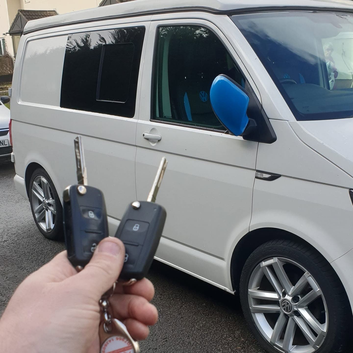 A pair of Audi flip keys cut and programmed for a yellow Audi S3